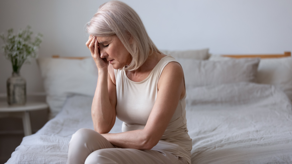 Woman Navigating The Physical Changes Of Menopause